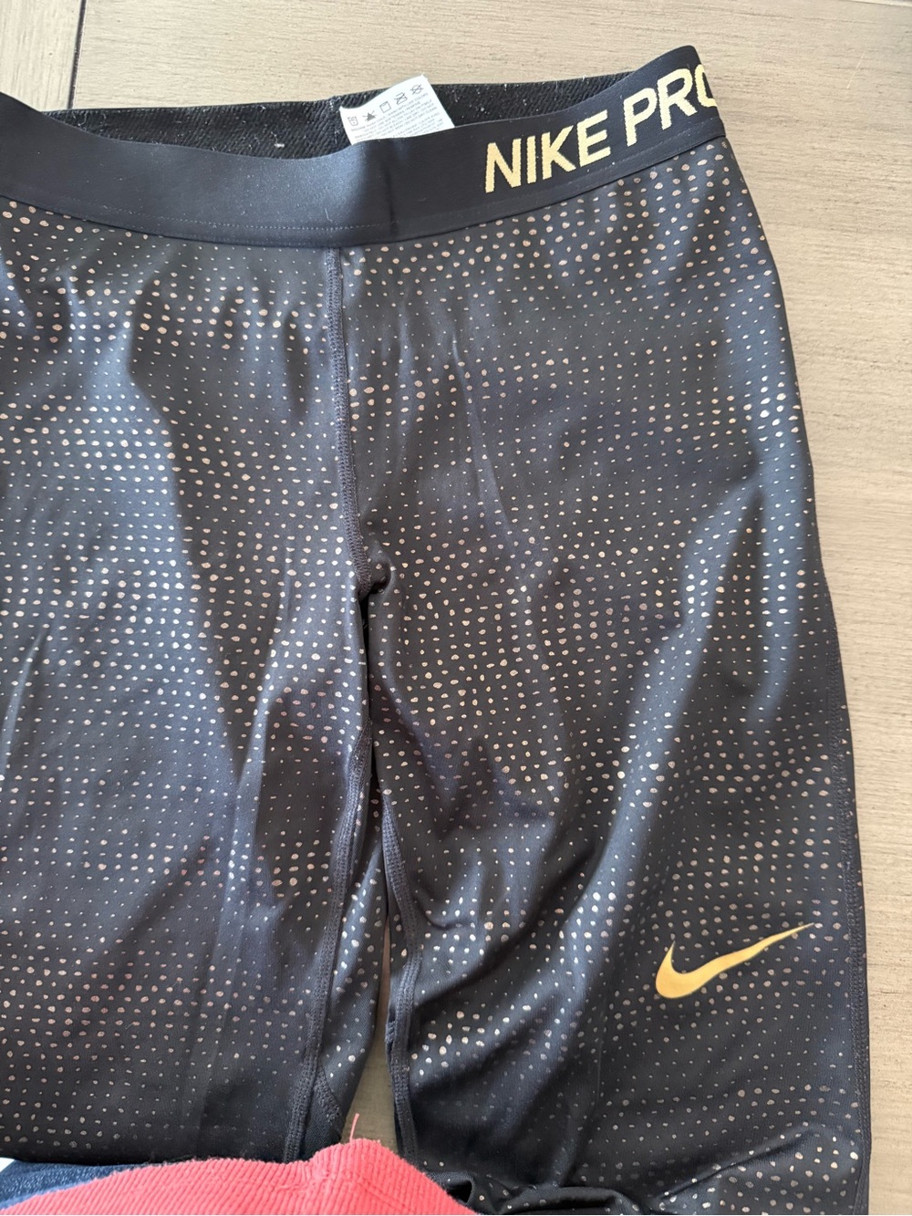 Nike Black Leggings with Gold Dot Accents